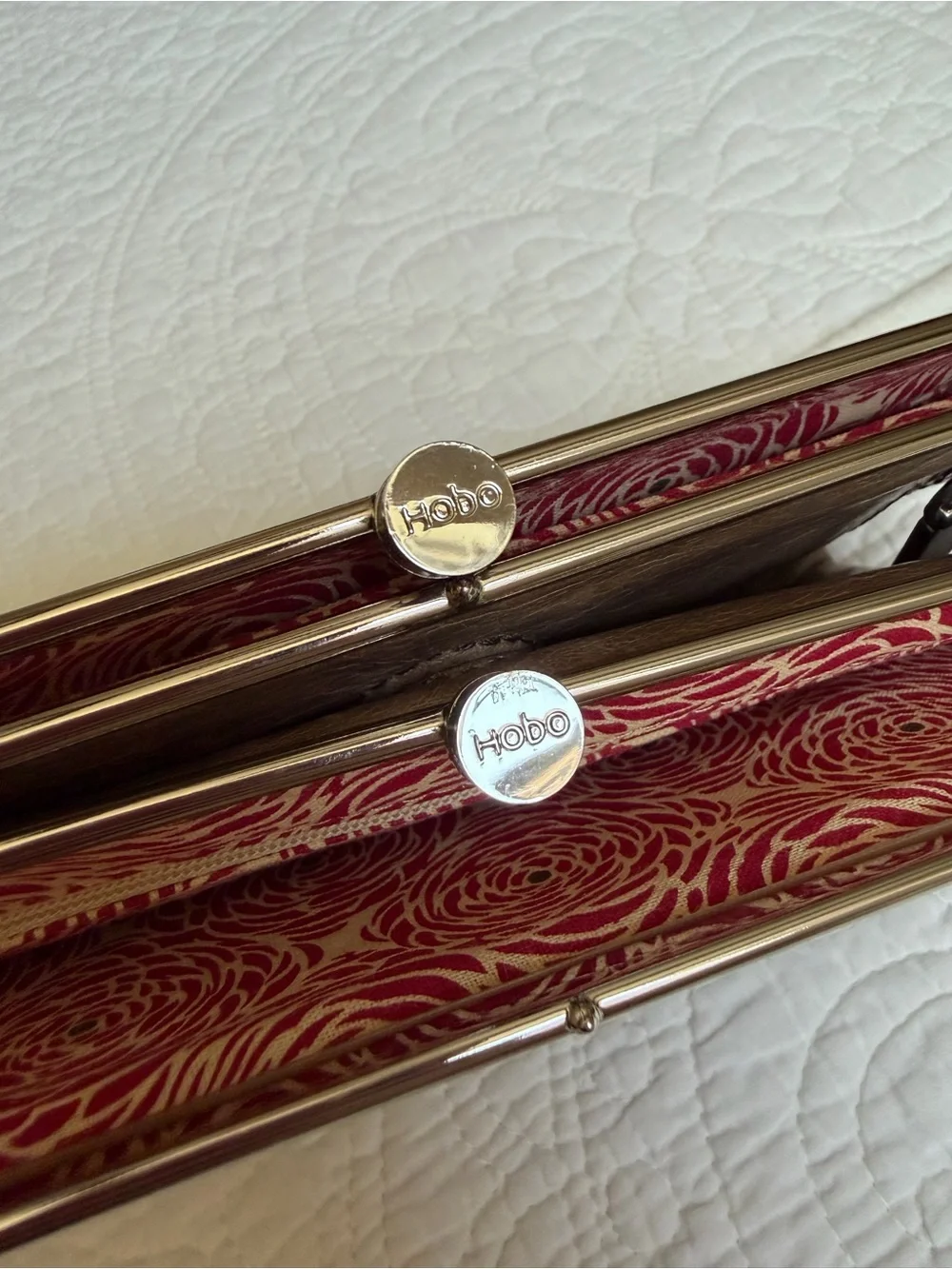 Hobo Lauren Clutch wallet embossed